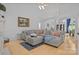 Spacious living room featuring ample seating, a vaulted ceiling, and an open layout perfect for entertaining at 400 Maymont Dr, Cramerton, NC 28032