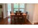 Bright dining room with wood table, chairs, and light from nearby patio at 4006 Tremont Dr, Indian Trail, NC 28079