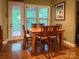 Cozy dining area with wood table, seating for six, and natural light at 4006 Tremont Dr, Indian Trail, NC 28079