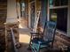 Inviting front porch with rocking chair and charming decor, showcasing a warm and welcoming entrance at 4006 Tremont Dr, Indian Trail, NC 28079