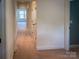 Hallway featuring carpet, doors and neutral colored walls at 4006 Tremont Dr, Indian Trail, NC 28079