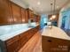 Spacious kitchen featuring granite countertops, custom cabinetry, and a center island at 4006 Tremont Dr, Indian Trail, NC 28079