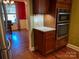 Kitchen with stainless steel double ovens and granite countertops open to dining area at 4006 Tremont Dr, Indian Trail, NC 28079