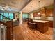 Open concept kitchen with wooden cabinets, granite countertops, and center island at 4006 Tremont Dr, Indian Trail, NC 28079