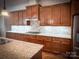 Modern kitchen with granite countertops, custom cabinets, and stainless steel appliances at 4006 Tremont Dr, Indian Trail, NC 28079