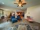 Open-concept living space with a cozy living room connected to a kitchen and dining area at 4006 Tremont Dr, Indian Trail, NC 28079
