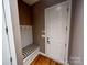 Functional mud room with bench, storage, and direct access to the home at 4006 Tremont Dr, Indian Trail, NC 28079