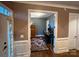 Inviting home office featuring hardwood floors, a desk, and a bookcase at 4006 Tremont Dr, Indian Trail, NC 28079