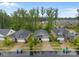 Aerial view of homes in a quiet residential neighborhood with tree-lined streets at 4008 Leyland Ct, Mint Hill, NC 28227