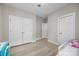 Neutral bedroom featuring double closets, providing ample storage solutions at 4008 Leyland Ct, Mint Hill, NC 28227