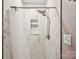 Close-up of the shower featuring a rain shower head and tiled surround at 405 Scarborough Ln, Matthews, NC 28105