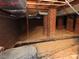 View of the crawlspace, showing the construction and foundation of the home at 4476 Nc Hwy 200 Rd, Stanfield, NC 28163