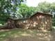 Charming brick home with mature trees providing shade and curb appeal at 4476 Nc Hwy 200 Rd, Stanfield, NC 28163