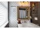 Well-lit bathroom featuring modern sink with granite countertop and stylish fixtures at 4516 Night Heron Ln, Charlotte, NC 28211