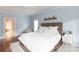 Cozy bedroom with hardwood floors, fan, and a neutral color palette at 4516 Night Heron Ln, Charlotte, NC 28211