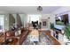 Inviting living room with wood floors and an adjacent entertainment space at 4516 Night Heron Ln, Charlotte, NC 28211