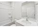 Bathroom with vanity, sink, mirror and shower over tub at 4619 Harris Elliot Rd, Lincolnton, NC 28092