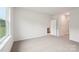 Bright bedroom boasts natural light, neutral tones and open doorway, creating a calming atmosphere at 4619 Harris Elliot Rd, Lincolnton, NC 28092