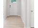Bright entryway featuring a white front door, light wood floors, and neutral walls at 4619 Harris Elliot Rd, Lincolnton, NC 28092