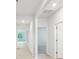 Bright hallway with neutral walls, hardwood floors, and doors leading to various rooms at 4619 Harris Elliot Rd, Lincolnton, NC 28092