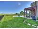 Expansive backyard with a pergola, pool, and manicured lawn, perfect for outdoor living at 4941 Campobello Dr, Monroe, NC 28110
