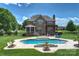 Beautiful backyard featuring a gunite pool, patio area with pergola, screened in porch, and lush lawn at 4941 Campobello Dr, Monroe, NC 28110