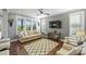 Comfortable living room offering great natural light, hardwood floors, and tasteful decor, creating a cozy atmosphere at 4941 Campobello Dr, Monroe, NC 28110