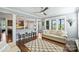 Inviting living room showcasing an open floor plan, access to the kitchen, and ample natural light, perfect for entertaining at 4941 Campobello Dr, Monroe, NC 28110