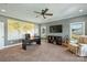 Large office space featuring a world map, office desk, and a comfortable reading chair at 4941 Campobello Dr, Monroe, NC 28110