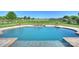 Inviting pool with a waterfall feature and lush landscaping at 4941 Campobello Dr, Monroe, NC 28110