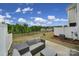 Backyard patio with gray seating at 5034 Moss Pine Way, Tega Cay, SC 29708