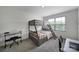 Bedroom with bunk beds, gray carpet, a desk, and a window at 5034 Moss Pine Way, Tega Cay, SC 29708