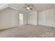 Bedroom with ceiling fan, closet, and easy access to the hallway, ensuring convenience at 5108 Tedorill Ln, Charlotte, NC 28226
