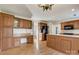 Spacious kitchen with wood cabinets, countertops, and modern appliances at 5108 Tedorill Ln, Charlotte, NC 28226