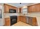 Functional kitchen showcases modern appliances, ample cabinet space and countertops at 5108 Tedorill Ln, Charlotte, NC 28226