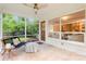 Inviting screened porch with a view of the backyard, featuring outdoor seating at 5162 Lincrest Pl, Charlotte, NC 28211