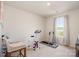 Exercise room featuring a treadmill, exercise bike and woven chair at 6011 Chelsea Oaks Rdg, Tega Cay, SC 29708
