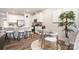 Open-concept kitchen with stainless steel appliances, a breakfast bar, and a dining area at 6011 Chelsea Oaks Rdg, Tega Cay, SC 29708
