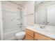 Clean bathroom features a shower-tub combo, toilet, and vanity with ample lighting at 8221 Brookings Dr, Charlotte, NC 28269