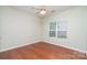 Bright bedroom with hardwood floors and a window offering ample natural light at 8221 Brookings Dr, Charlotte, NC 28269