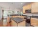 Stylish kitchen featuring granite counters, stainless appliances and central island for added prep space at 8221 Brookings Dr, Charlotte, NC 28269