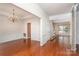 Bright, open-concept living space with hardwood floors and elegant wainscoting at 8221 Brookings Dr, Charlotte, NC 28269