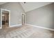 Spacious primary bedroom with neutral paint, plush carpet, and recessed lighting at 8825 Harris Rd, Concord, NC 28027