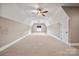 Expansive bonus room with carpet flooring and neutral wall colors at 8825 Harris Rd, Concord, NC 28027
