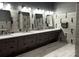 Modern bathroom with multiple sinks and decorative mirror at 934 Prince Garrett Way, Denver, NC 28037