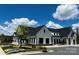 Exterior view of a commercial building with blue skies and a well-maintained lawn at 934 Prince Garrett Way, Denver, NC 28037