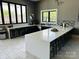 Resident kitchen featuring stainless steel appliances and eat-in island at 934 Prince Garrett Way, Denver, NC 28037
