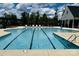 Outdoor swimming pool with lounge seating and beautiful sky at 934 Prince Garrett Way, Denver, NC 28037