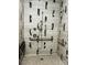 Modern shower with tiled walls and convenient grab bars at 934 Prince Garrett Way, Denver, NC 28037