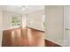 Bright and airy bedroom with hard wood floors and multiple windows at 9430 Duckhorn Dr, Charlotte, NC 28277
